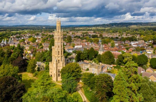 The beautiful, sun-dappled tower of Hadlow Castle in Tonbridge, Kent