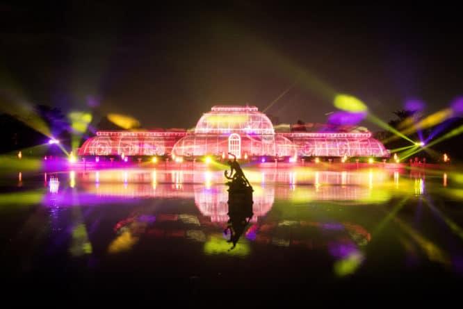 projections over the greenhouse at the christmas at kew trail