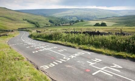 Ahead of the 2014 Tour de France, cycling fans graffitied the road on Kidstones Pass, or Côte de Kidstones, a challenging category-four climb.